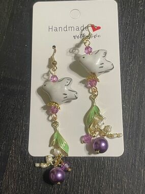 Hand Crafted White Dove Earrings with Purple Accents